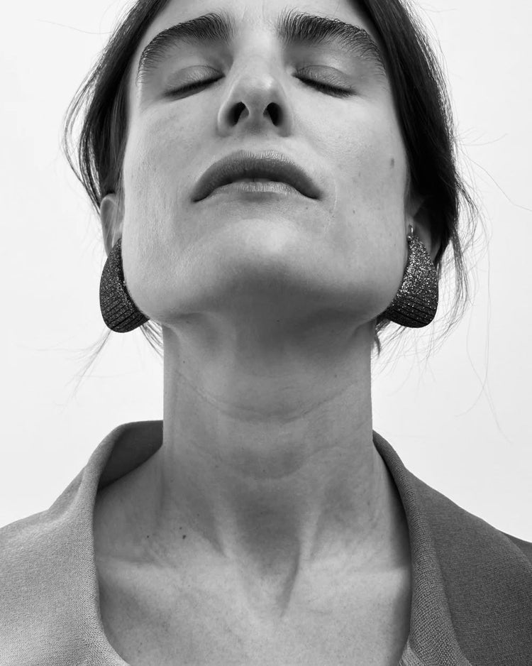 SO-LE STUDIO sculptural jewellery by Maria Sole Ferragamo, part of the House of Woven Stories selection, crafted from upcycled leather and brass with bold, lightweight design.