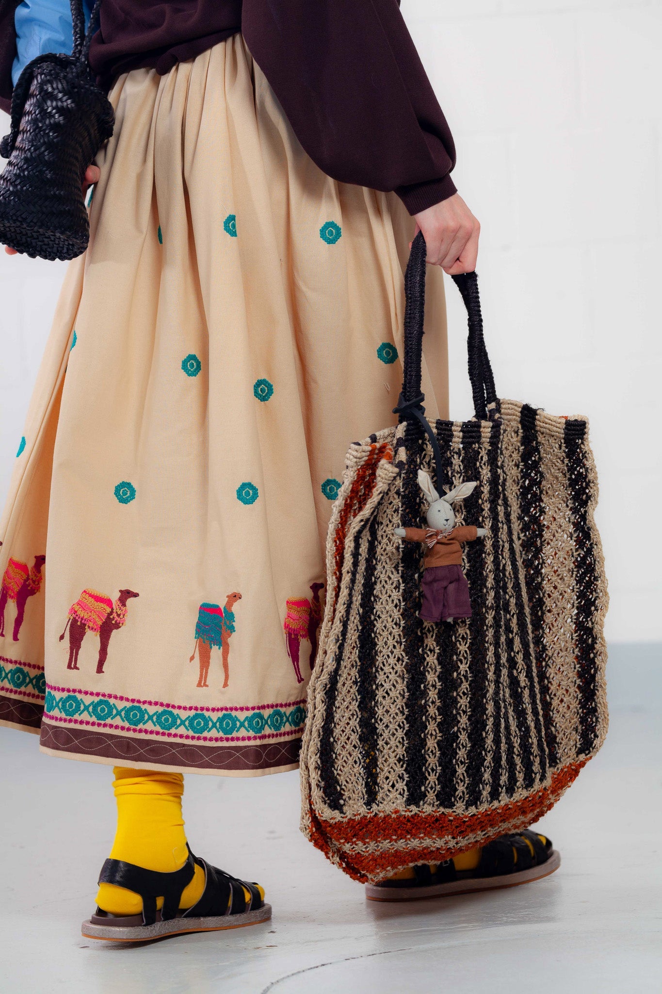 Adan Black Sandals by Collection PRIVĒE in ovine leather with a sleek silhouette and lightweight microsolite sole. Available at House of Woven Stories.