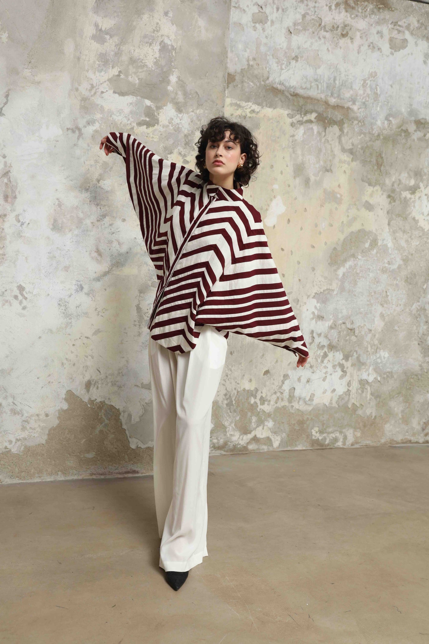 Ka-Sha Bat Shirt: hand-dyed cotton, reversible pattern, appliqué details. Versatile, sustainable artisan fashion from House of Woven Stories.