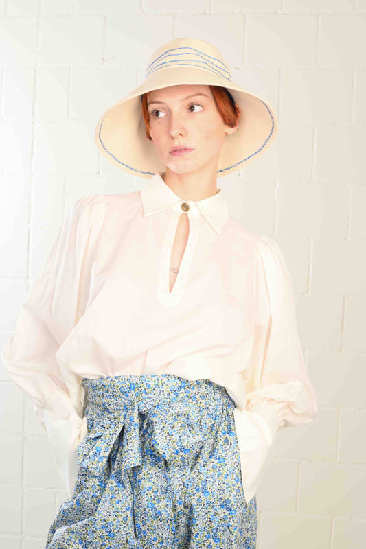 Cobalt blue stitched canvas bucket hat by Lola Hats, handmade from sail canvas with a medium brim and flexible design. Available at House of Woven Stories.