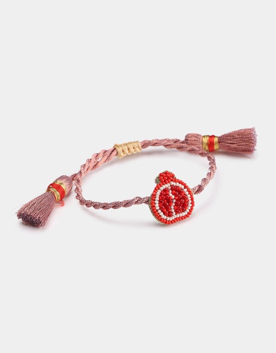 Discover Olivia Dar’s hand-beaded Anar bracelet from the Fruit Punch collection. Handmade in New Delhi with sustainable materials and ethical craftsmanship. Part of House of Woven Stories selection.