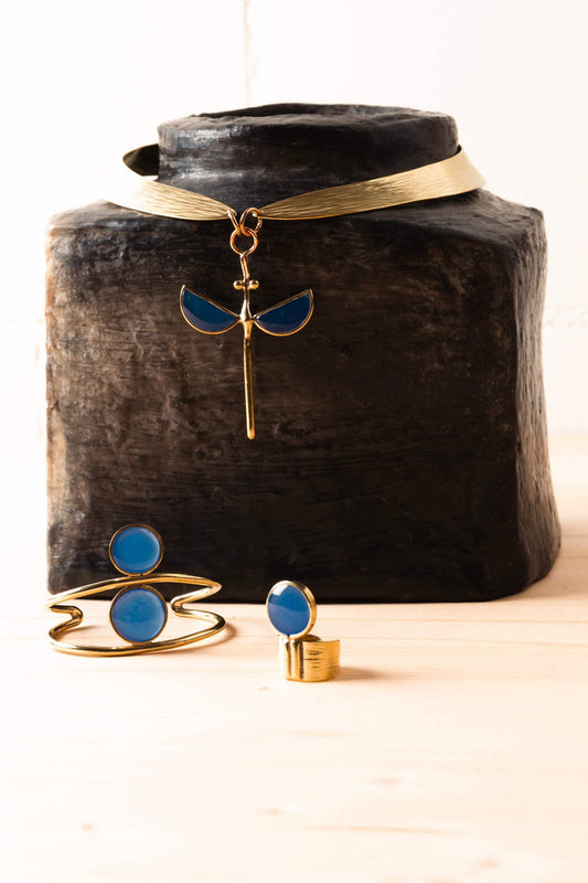 Royal Blue Double Third Eye hammered bronze bracelet by Stéphane Szendy with symmetrical enamel eye motifs. By House of Woven Stories.