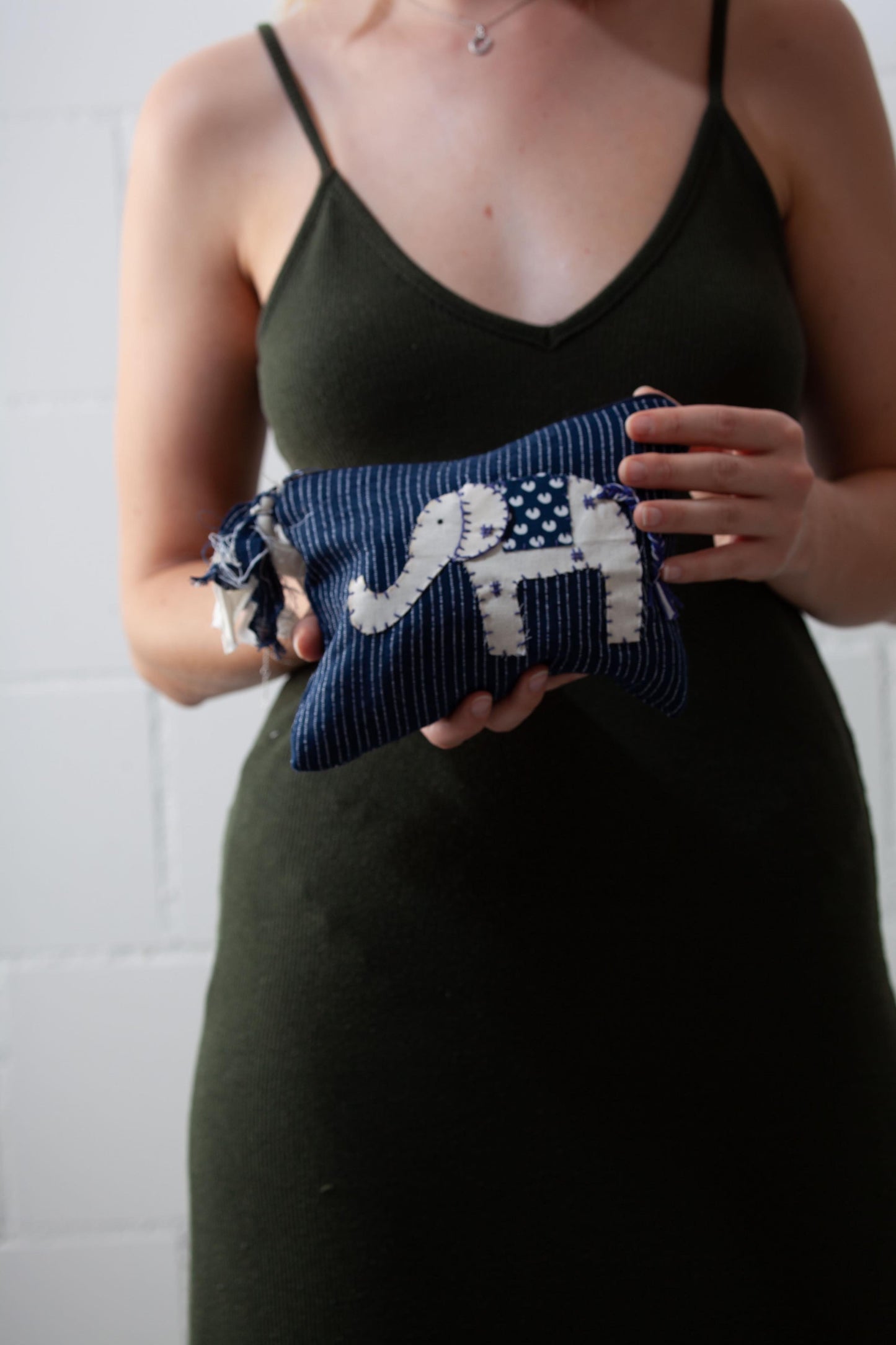 SilaiWali handcrafted vanity pouch made from upcycled fabric, sewn by Afghan refugee women