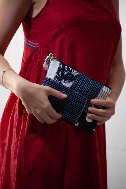 Handcrafted vanity pouch by SilaiWali made from upcycled fabric, stitched by Afghan refugee women for sustainable living.