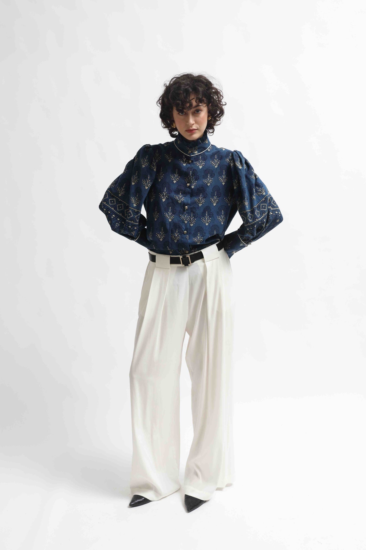 Karin blouse made from 100% organic cotton with Ajrakh blockprint in natural indigo blue, featuring volant detail, handcrafted by House of Woven Stories.