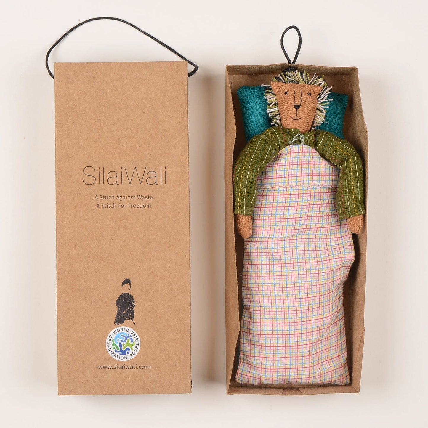 Kom Mini lion cloth doll handcrafted from upcycled fabric by Afghan refugee women for sustainable fashion. The brand is SilaiWali and it's available at House of Woven Stories.