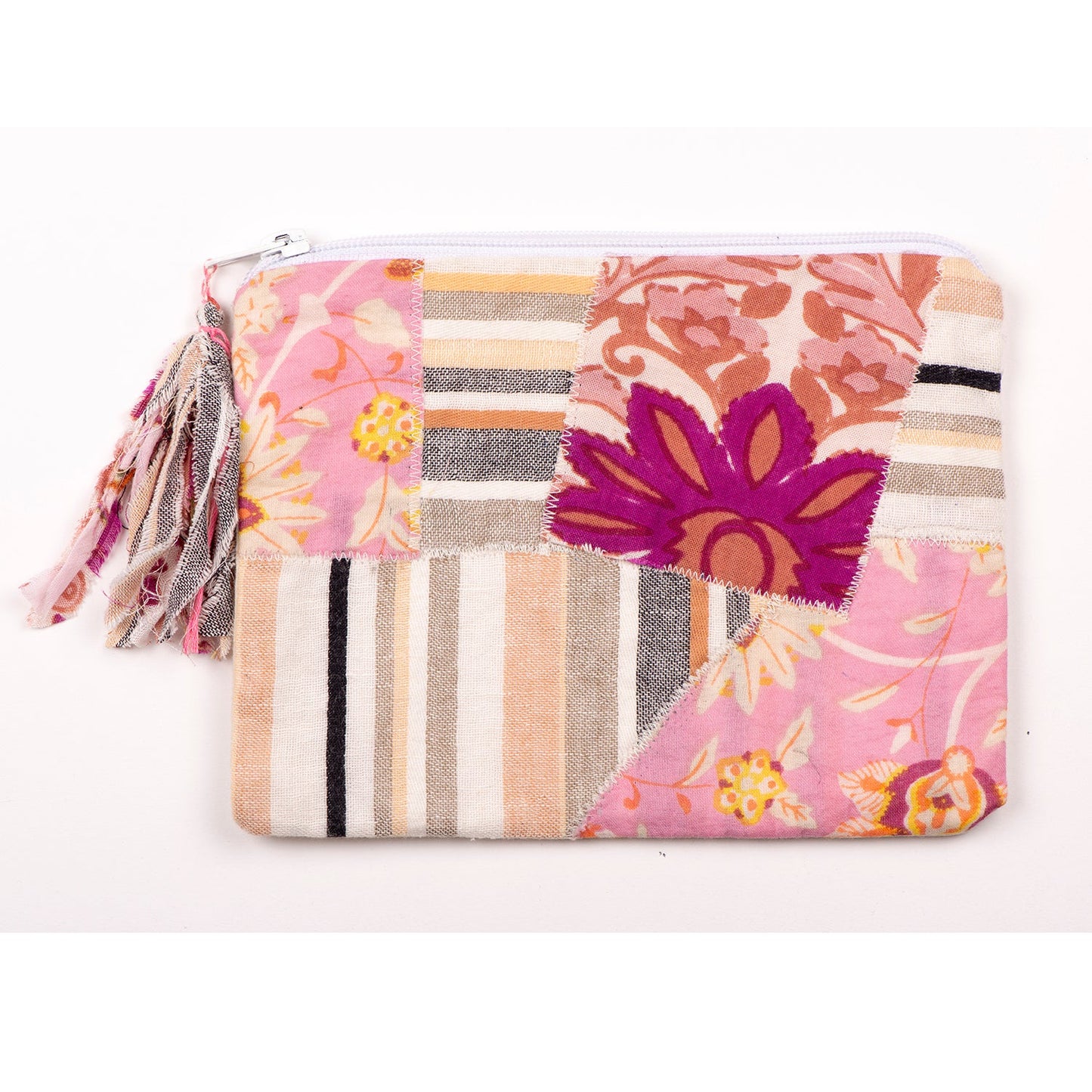 Krishna handcrafted vanity pouch made from upcycled fabric by Afghan refugee artisans, eco-friendly and ethically made accessory from SilaiWali, available at House of Woven Stories.