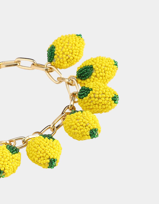 Hand-beaded Olivia Dar Lemons Vintage Charm bracelet with 3D yellow bead design from the Fruit Punch collection.