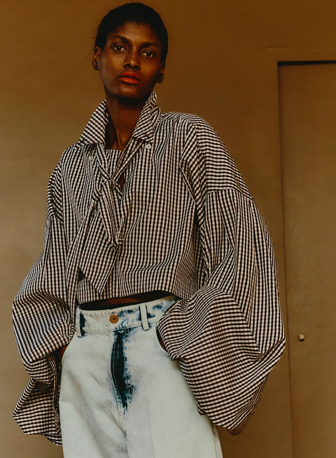 Maison Jejia Aliss Shirt in black and white check with oversized sculptural sleeves, wide cuffs and a cropped silhouette, curated by House of Nomad Stories