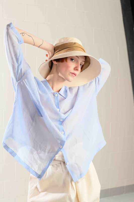 Medium-brimmed cotton fedora hat by Lola Hats, designed for travel and breezy weather, handcrafted in Brooklyn. Available at House of Woven Stories.