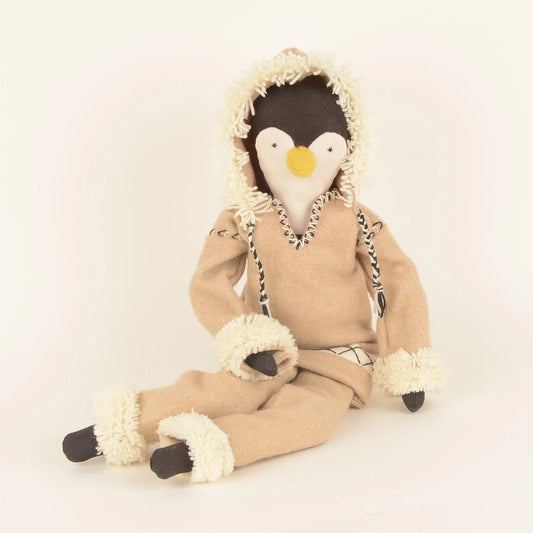 Handcrafted Patuk the Penguin soft toy made from upcycled fabric, created by Afghan refugee women artisans through SilaiWali, with bedding included in a foldable gift box.