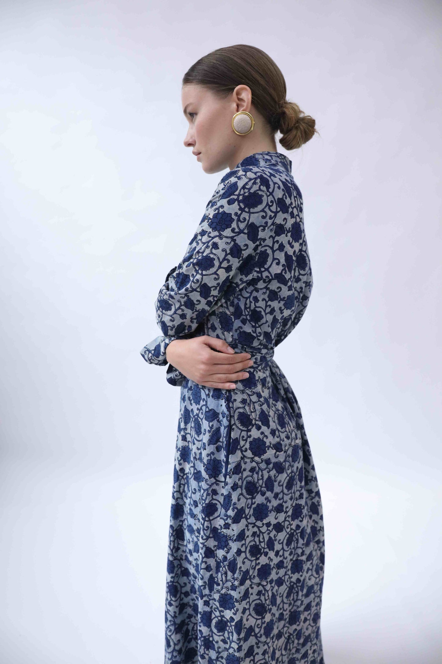 Silk shirt dress with Ajrakh block print by Obidi, crafted from upcycled antique saris. Features a mandarin collar, side pockets, and matching belt. Handcrafted, one-of-a-kind piece from the House of Woven Stories collection.