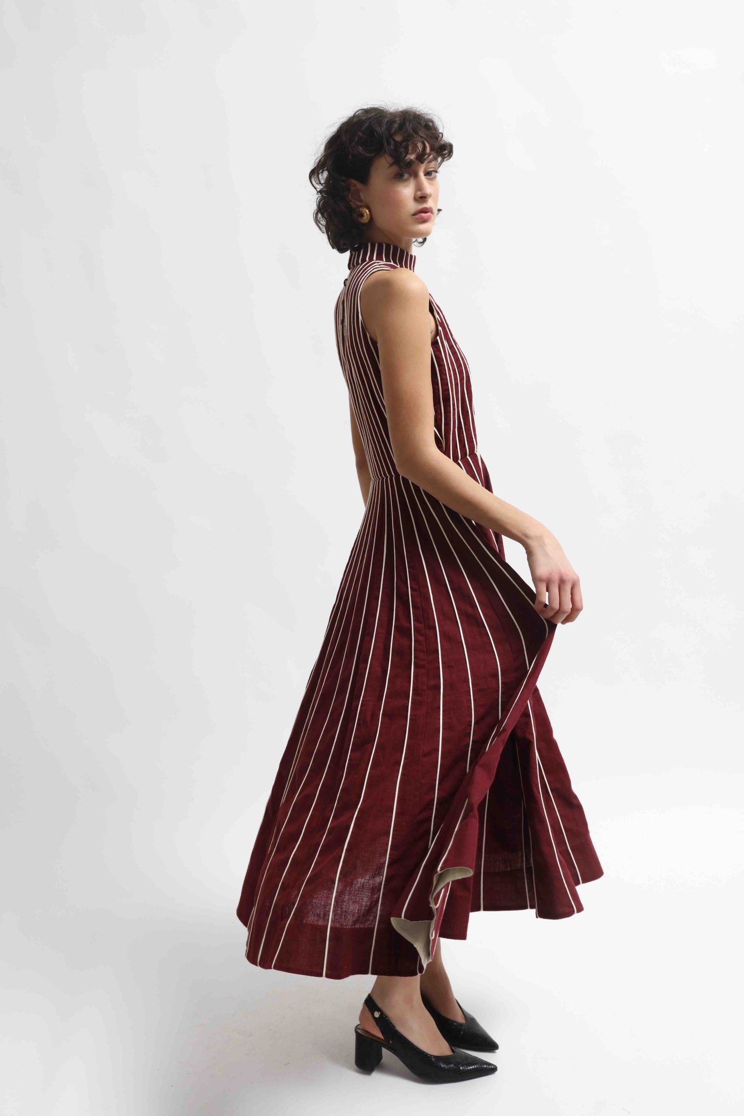 Thakur Dress by Ka-Sha – long striped hand-dyed Kala Cotton dress with front-open design. A sustainable, artisanal piece blending tradition and modern style. Part of House of Woven Stories selection.