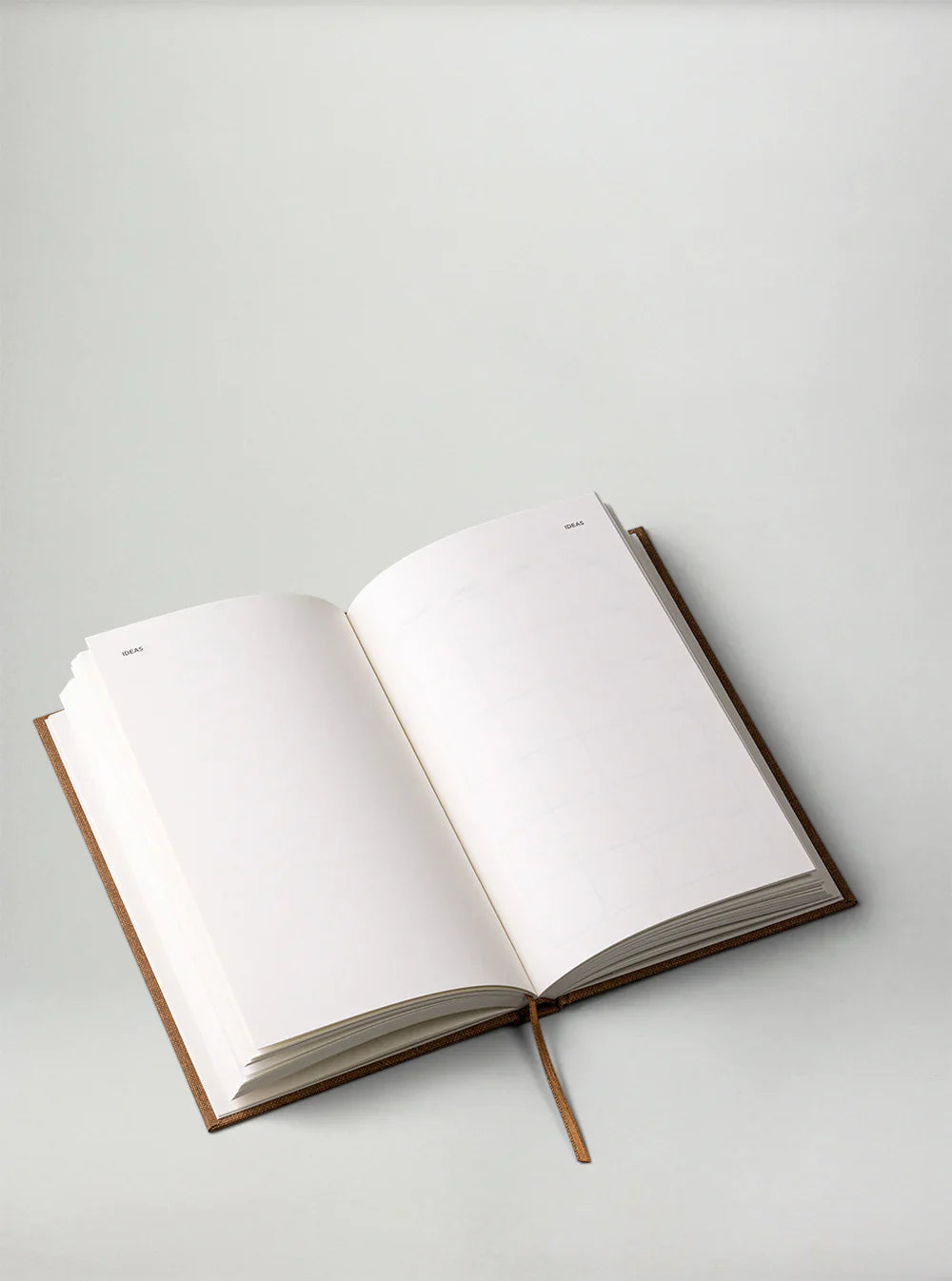 Sand Yearly Planner by New Mags, undated minimalist planner with monthly and daily pages.