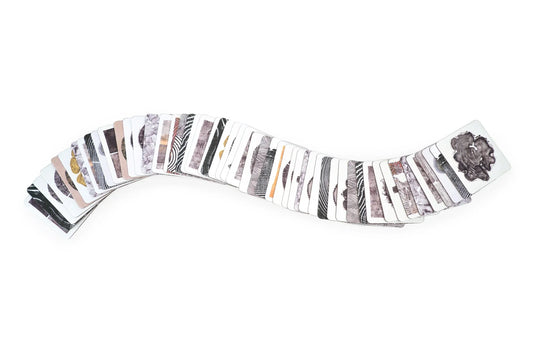 Woodcut Memory Game by New Mags featuring 52 matching cards with intricate tree ring designs