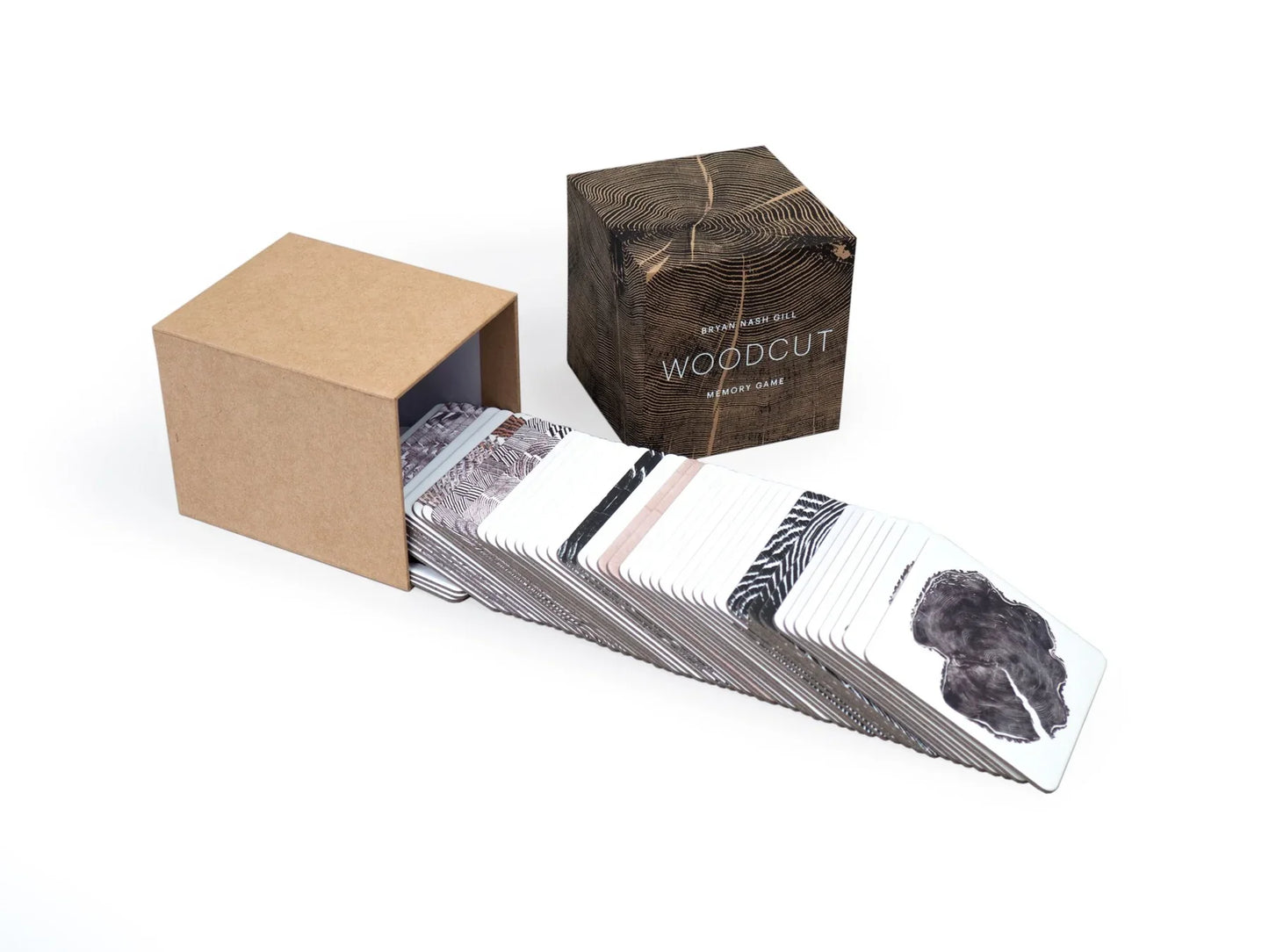 Woodcut Memory Game by New Mags featuring 52 matching cards with intricate tree ring designs