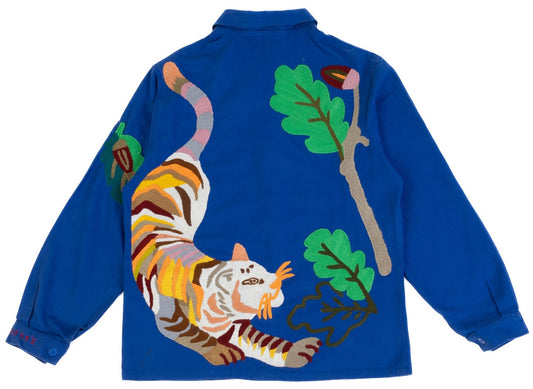 Bleu de Travail vintage French workwear jacket by Kilometre Paris, hand-embroidered with birds and flowers, part of the House of Woven Stories selection.