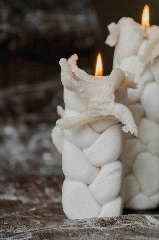 Handcrafted beeswax; irregularities in shape, color, size, and light grey tinge are natural characteristics.