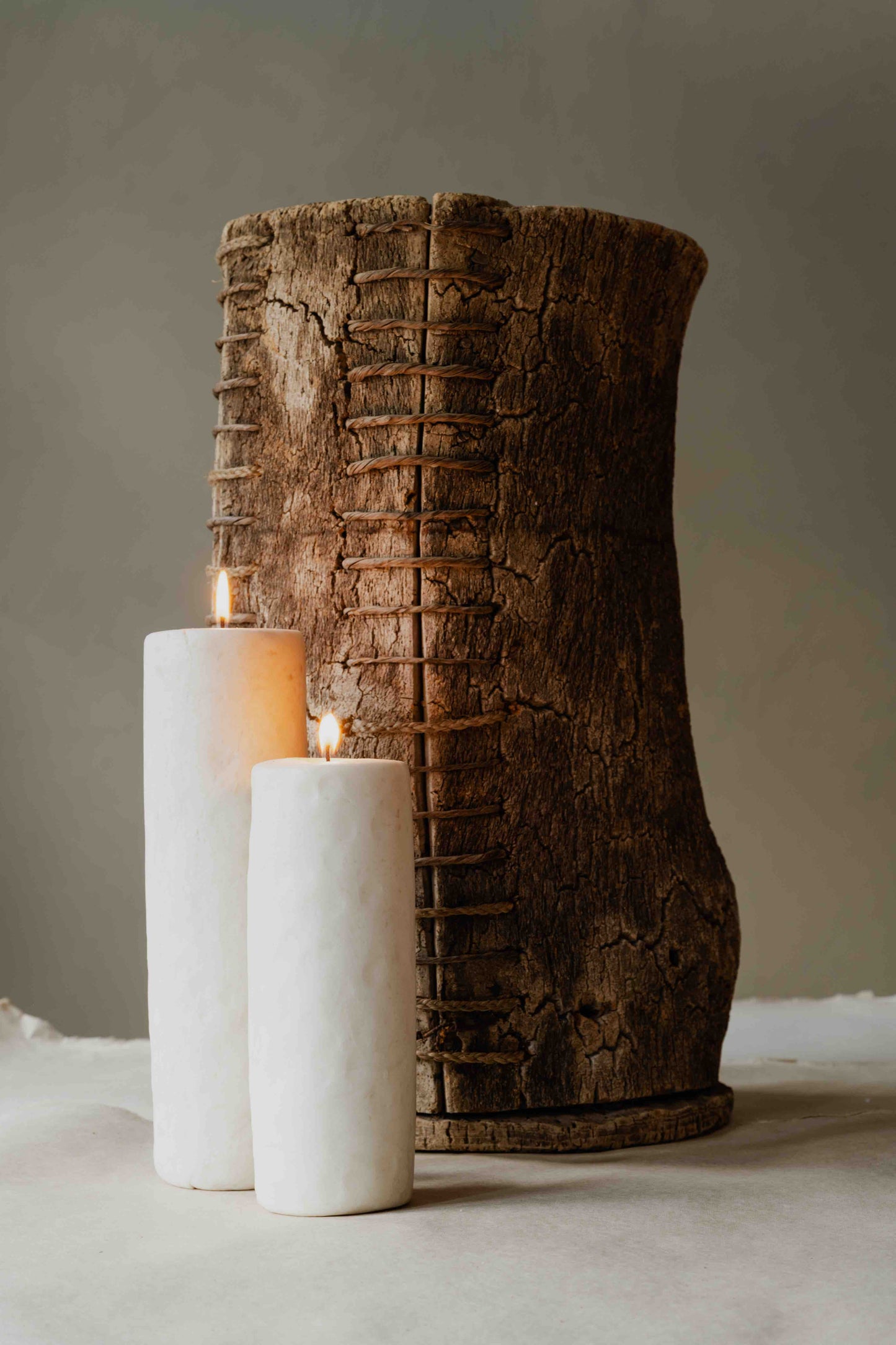 KLOTZ 1-Wick Round Low beeswax candle by Oberflacht, part of the House of Woven Stories selection, handmade in the Black Forest with unique variations in colour, shape, and texture.