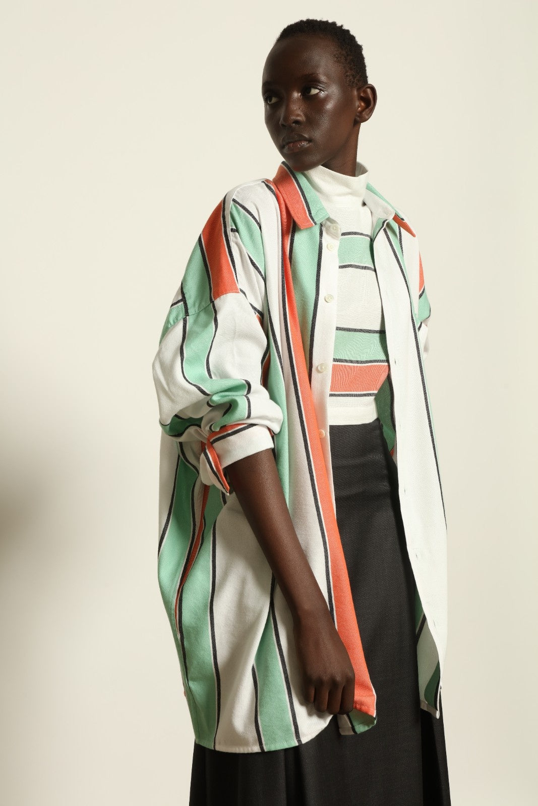 Model is wearing the Oversized Shirt with Collar by Marrakshi Life, part of House of Nomad Stories collection, handwoven cotton shirt with relaxed architectural fit, structured collar, and versatile styling