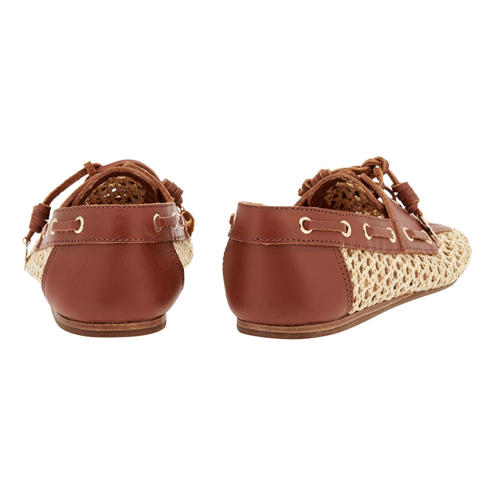 Pliaria Boat Shoe in Natural raffia and Vachetta leather by Ancient Greek Sandals, handmade in Greece with gold charm detail