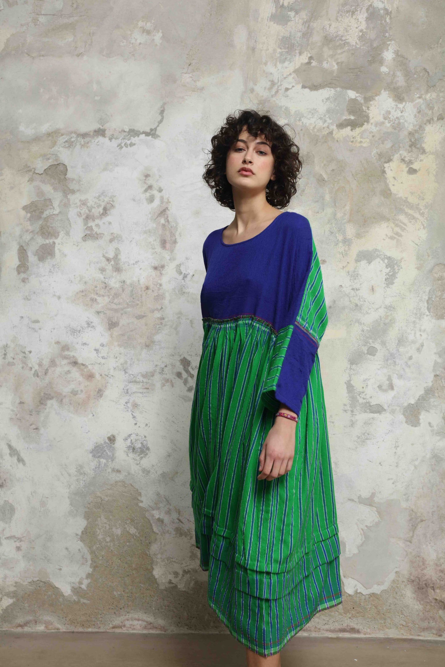 Handloom wool midi dress in indigo and green by Injiri, artisan-made in India with sustainable craftsmanship. Available at House of Woven Stories.