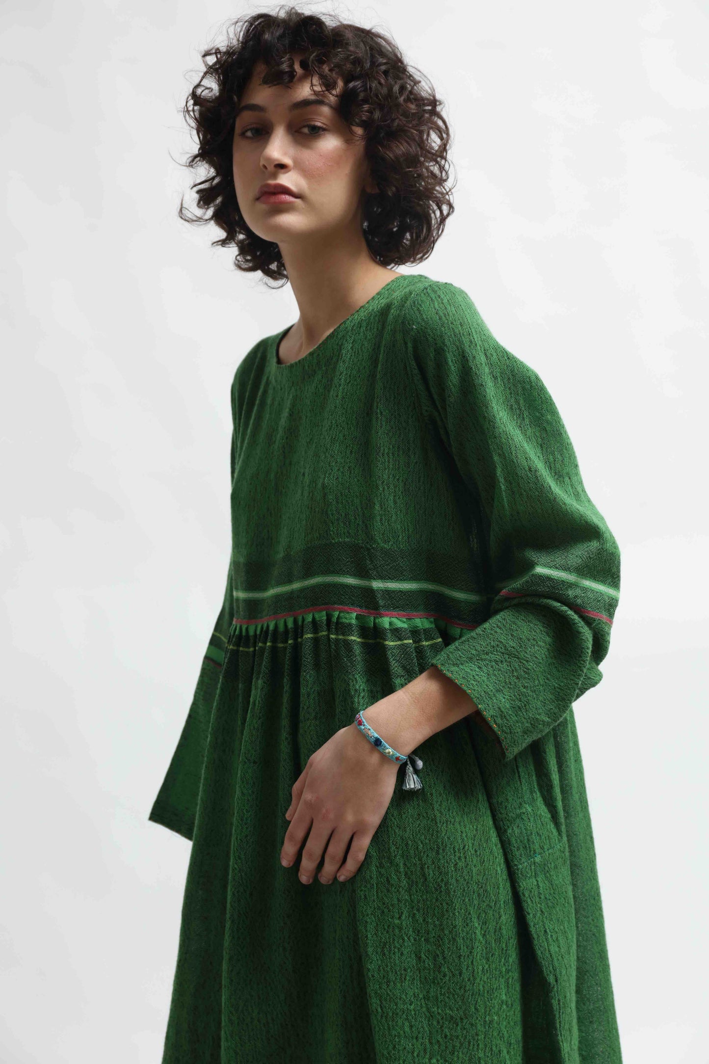 Handloomed green pure wool midi dress Rang 08 by Injiri, artisan-made in India with sustainable craftsmanship. Available at House of Woven Stories.