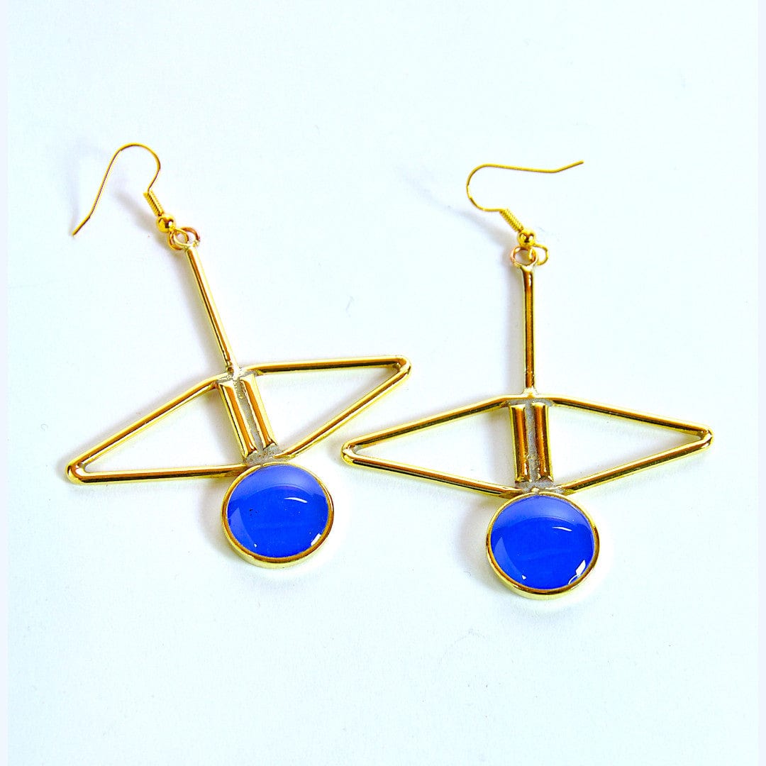 Royal blue handcrafted pendant earrings by Stéphane Szendy, featuring sculptural bronze shapes with enamel circle details. Part of House of Woven Stories selection.