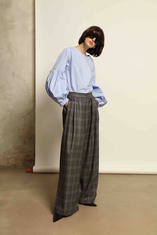 Model wearing the Sky Blue Lulu Pure Poplin Cotton Blouse with balloon sleeves by House of Woven Stories, crafted in Italy.