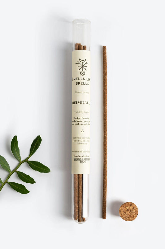 Handmade natural incense sticks with juniper berries, sandalwood, guar gum, and wild herbs, designed for protection and energy cleansing by Smells Like Spells. Pack of five sticks with a calming, earthy aroma.