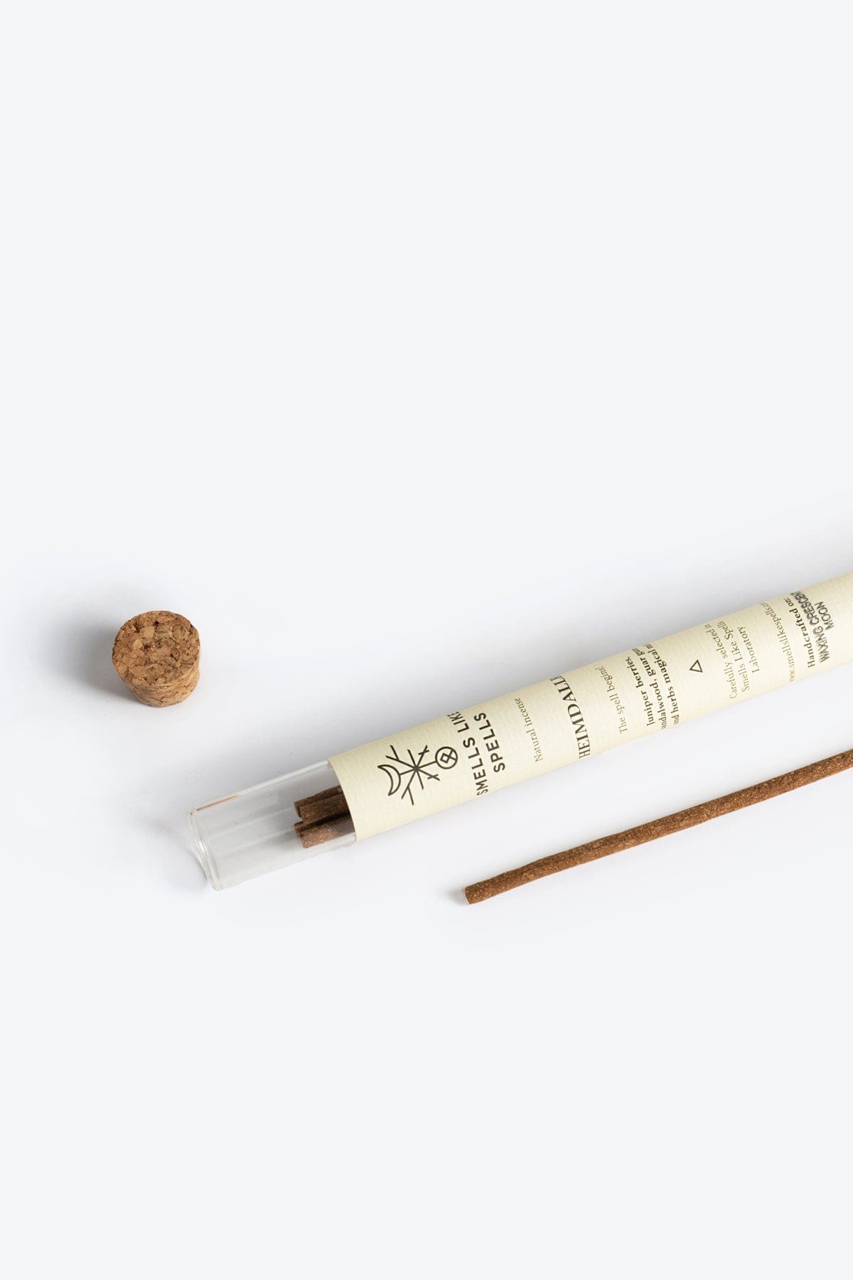 Handmade natural incense sticks with juniper berries, sandalwood, guar gum, and wild herbs, designed for protection and energy cleansing by Smells Like Spells. Pack of five sticks with a calming, earthy aroma.