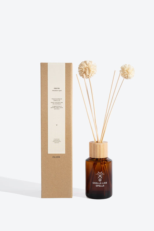 Freyr home fragrance diffuser by Smells Like Spells, handcrafted with patchouli, agarwood, and ambergris for financial prosperity and positive energy.
