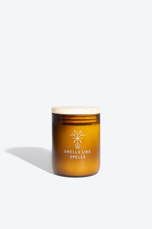 Handmade natural soy-wax aromatic candle by Smells Like Spells with rosemary, lavender, and myrrh scent, designed to cleanse negative energy and bring harmony and protection to the home.
