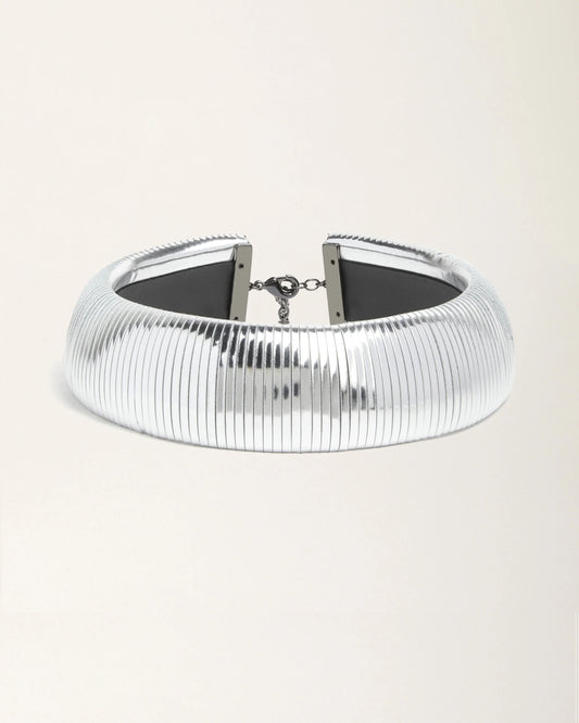 Halo Silver Foil leather necklace by SO-LE STUDIO, handcrafted in Tuscany, bold circular silver-toned design with foil finish, lightweight and sculptural on the neckline