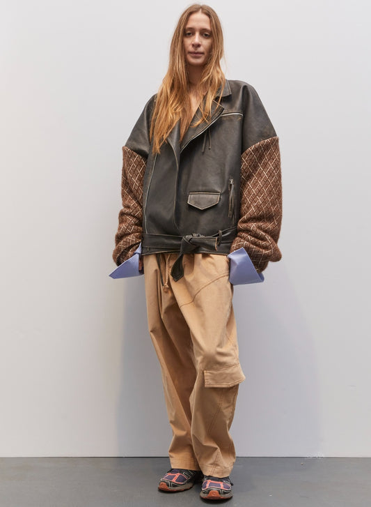 Model wearing the Tea Beige Velvet Pant by Maison Jejia, part of the House of Woven Stories selection, in plush beige velvet with a relaxed tailored fit and soft, comfortable texture