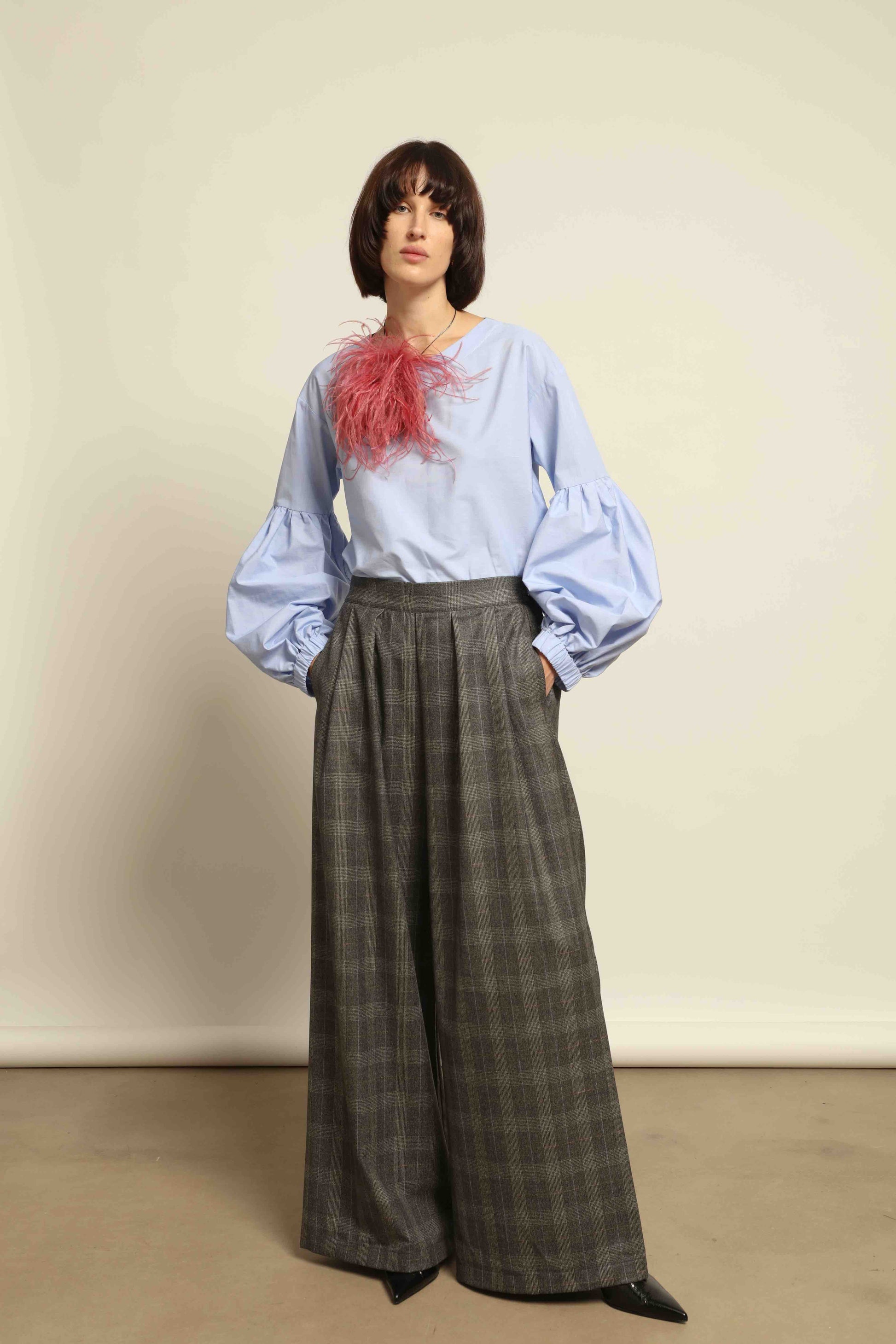 Model wearing the Sky Blue Lulu Pure Poplin Cotton Blouse with balloon sleeves by House of Woven Stories, crafted in Italy.