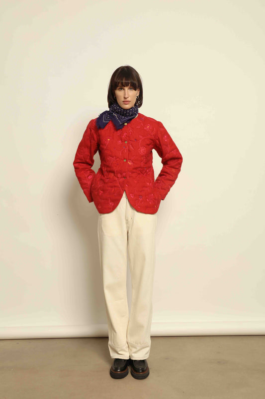Model is wearing the Folklore 58 Jacket by Injiri, handloomed in scarlet red silk and wool with a lightweight yet structured cut, combining tradition and modern elegance.