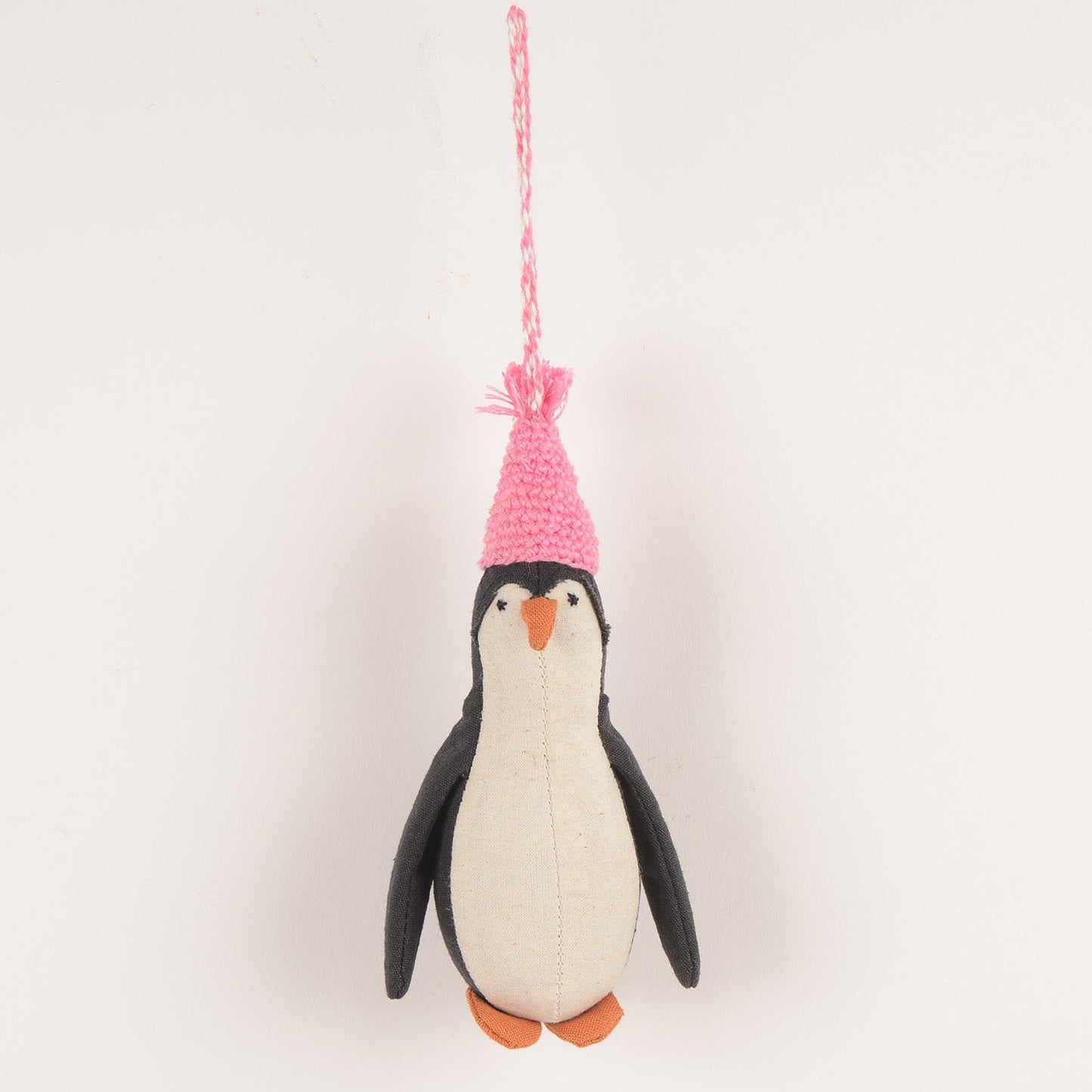 Handcrafted penguin-shaped hanging charm made from upcycled waste fabric by SilaiWali.