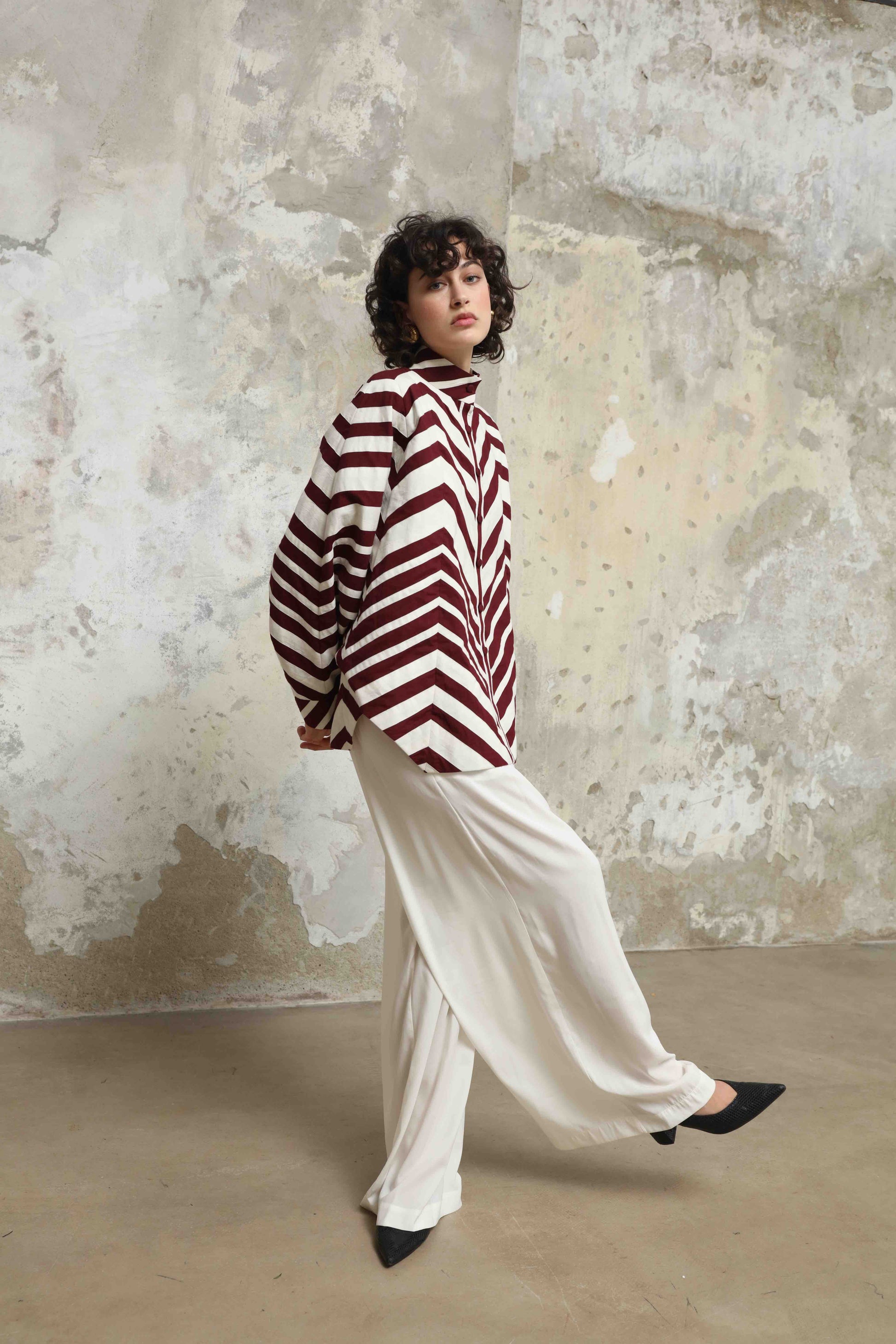 Ka-Sha Bat Shirt: hand-dyed cotton, reversible pattern, appliqué details. Versatile, sustainable artisan fashion from House of Woven Stories.