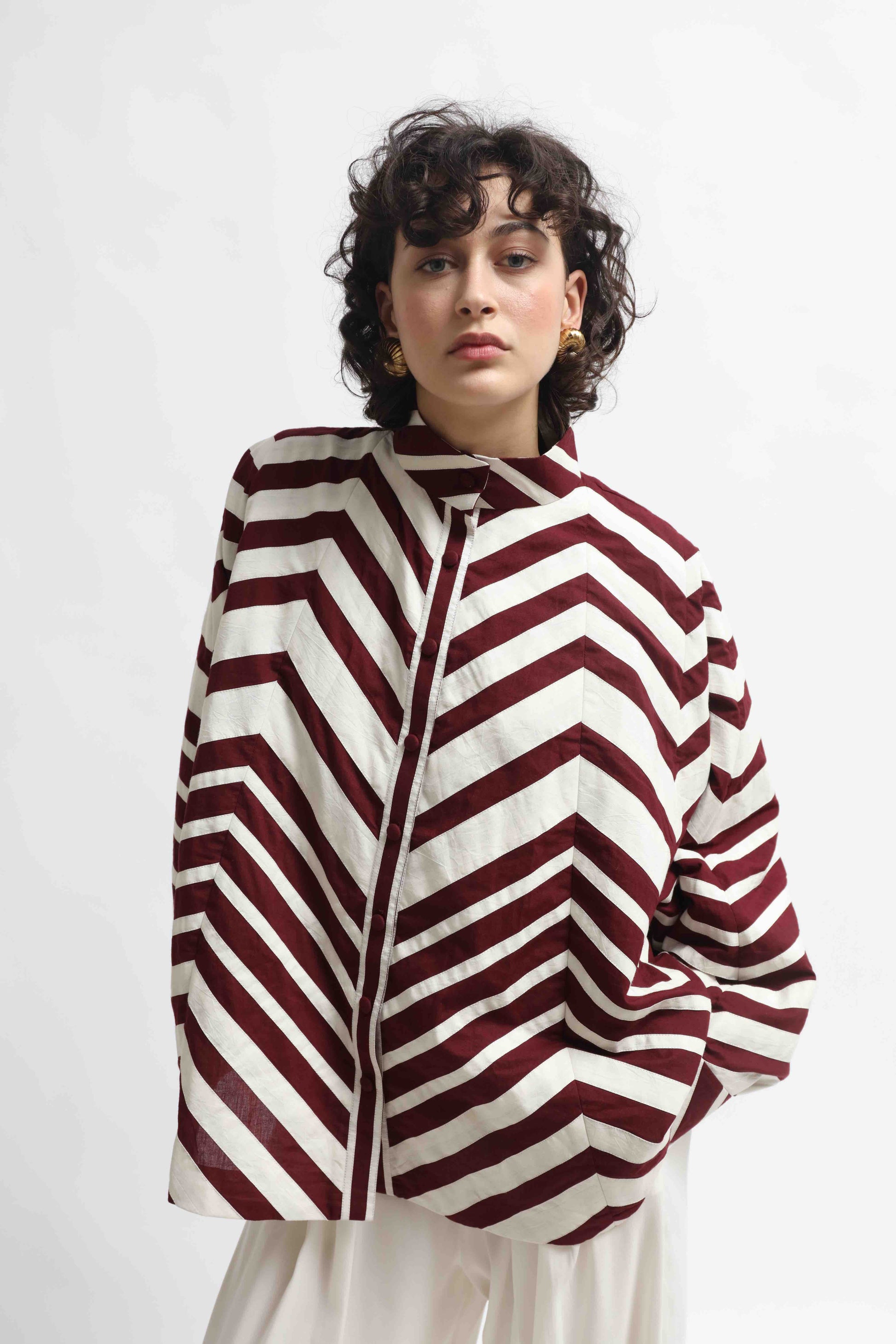 Ka-Sha Bat Shirt: hand-dyed cotton, reversible pattern, appliqué details. Versatile, sustainable artisan fashion from House of Woven Stories.