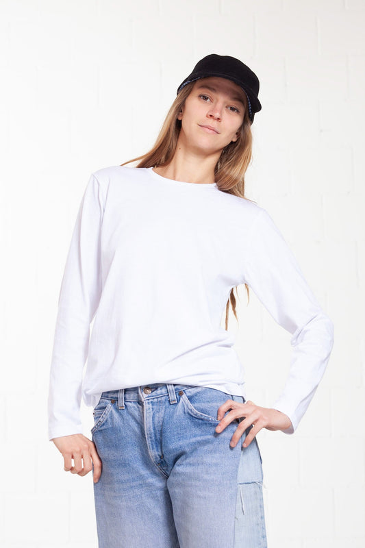 Unisex long sleeve T-shirt in soft 100% organic cotton, featuring a seamless design and minimalist fit. Made in Italy by House of Woven Stories.