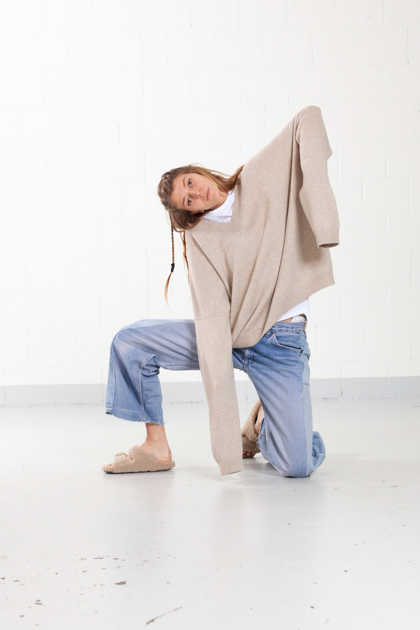 Unisex long sleeve T-shirt in soft 100% organic cotton, featuring a seamless design and minimalist fit. Made in Italy by House of Woven Stories.