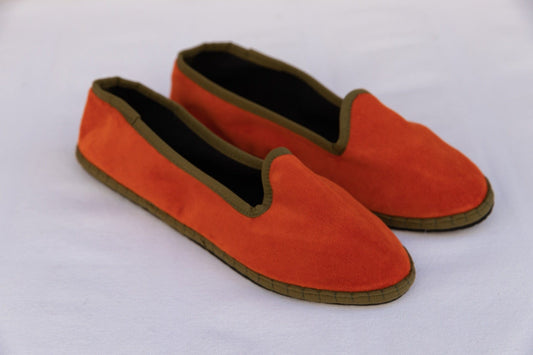 Handmade in Venice from upcycled luxury fabrics with recycled rubber soles. Brick and Olive Venetian Slippers by Teod’amar are timeless and sustainable. Part of House of Woven Stories section. 