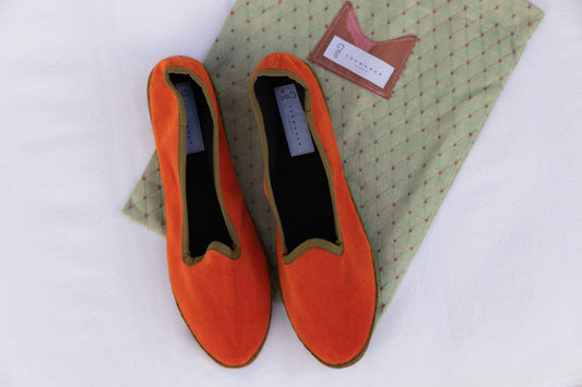 Handmade in Venice from upcycled luxury fabrics with recycled rubber soles. Brick and Olive Venetian Slippers by Teod’amar are timeless and sustainable. Part of House of Woven Stories section. 