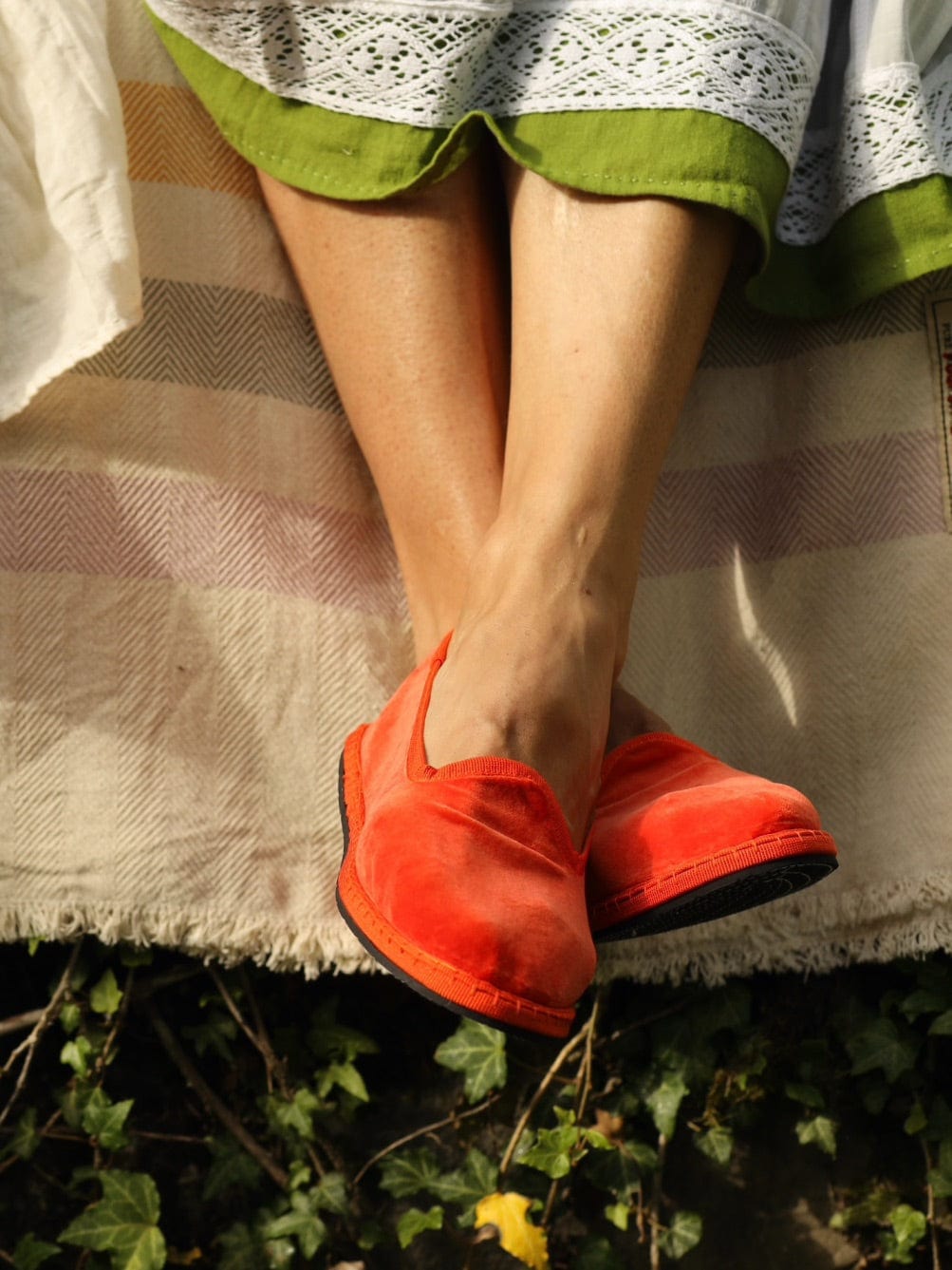 Handmade in Venice from upcycled luxury fabrics with recycled rubber soles. Bright Orange Venetian Slippers by Teod’amar are timeless and sustainable. Part of House of Woven Stories section. 