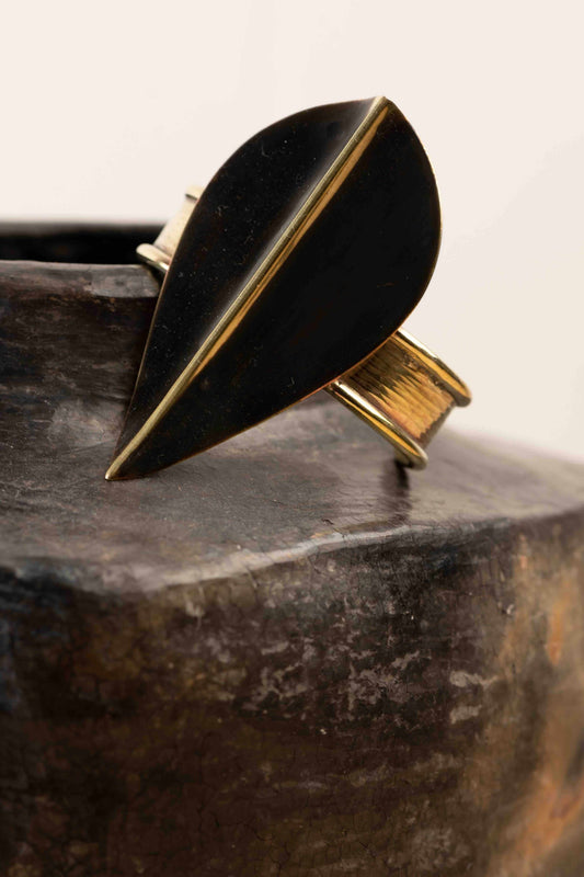 Bronze Patinè Noir hammered bronze slip-on bracelet by Stéphane Szendy, showcasing artisanal craftsmanship and timeless design. Part of HouseofWovenStories selection.