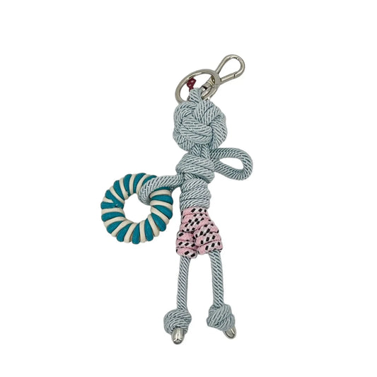 Charlie Keyring by MY BOB, a 20 cm handmade macramé accessory inspired by 70s style, crafted in Italy. Adds a colorful, personal touch to bags or keys. Comes with a soft cotton pouch.