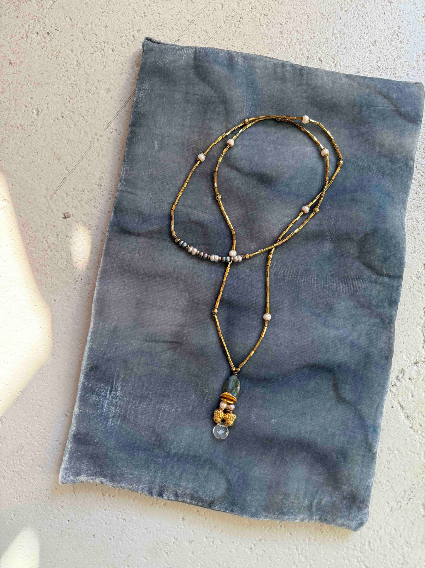 Gold and Labradorite Totem Pendant choker featuring pyrite, freshwater pearls, labradorite, rock crystal, and brass details. Handcrafted in Italy by Ilaria Fiorentini Jewellery. Bold, elegant statement piece from House of Woven Stories selection.