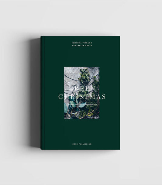 Green Christmas book cover featuring festive floral wreath and holiday decorations by New Mags. Shop now!