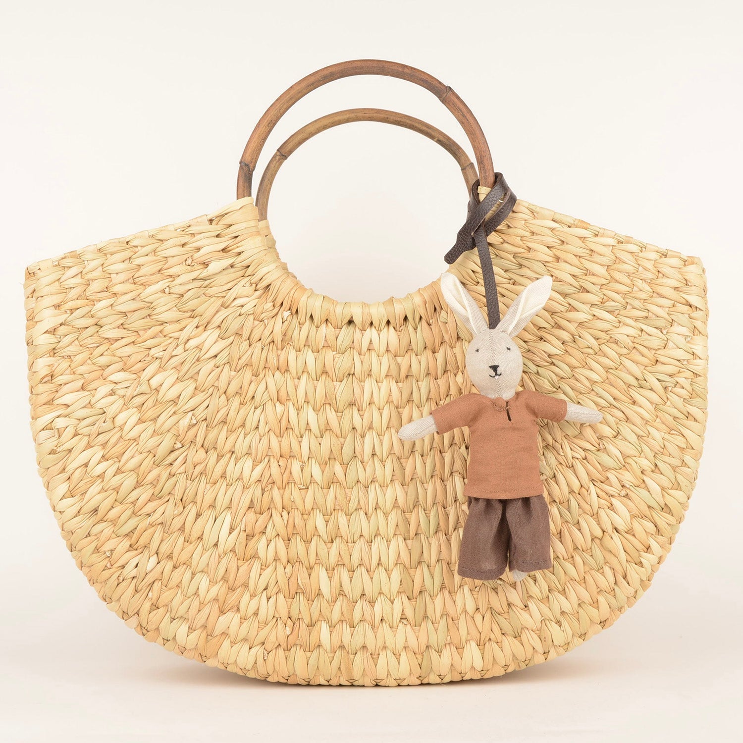 Handcrafted bunny bag charm made from upcycled fabric and colorful beads by Afghan refugee women artisans from SilaiWali.